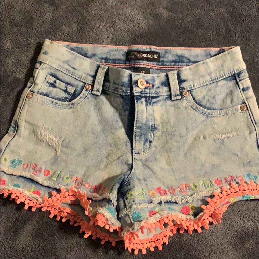 Jordache shorts wit neon pink frills at the bottom